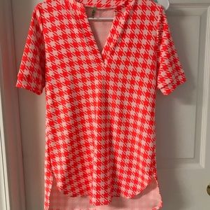 white and orange tunic